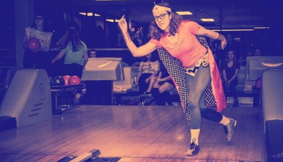 person dressed as wonder woman bowling